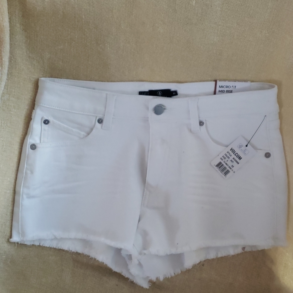 White denim Volcom mid rise shorts